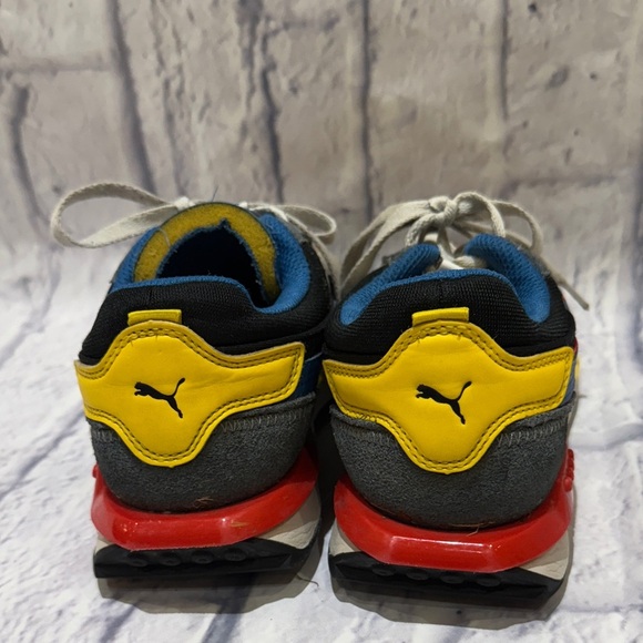 Puma Sneakers with Yellow, Blue, and Red Highlights - Picture 6 of 7